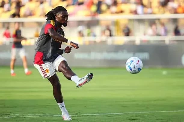 Player kicking a soccer ball during training session