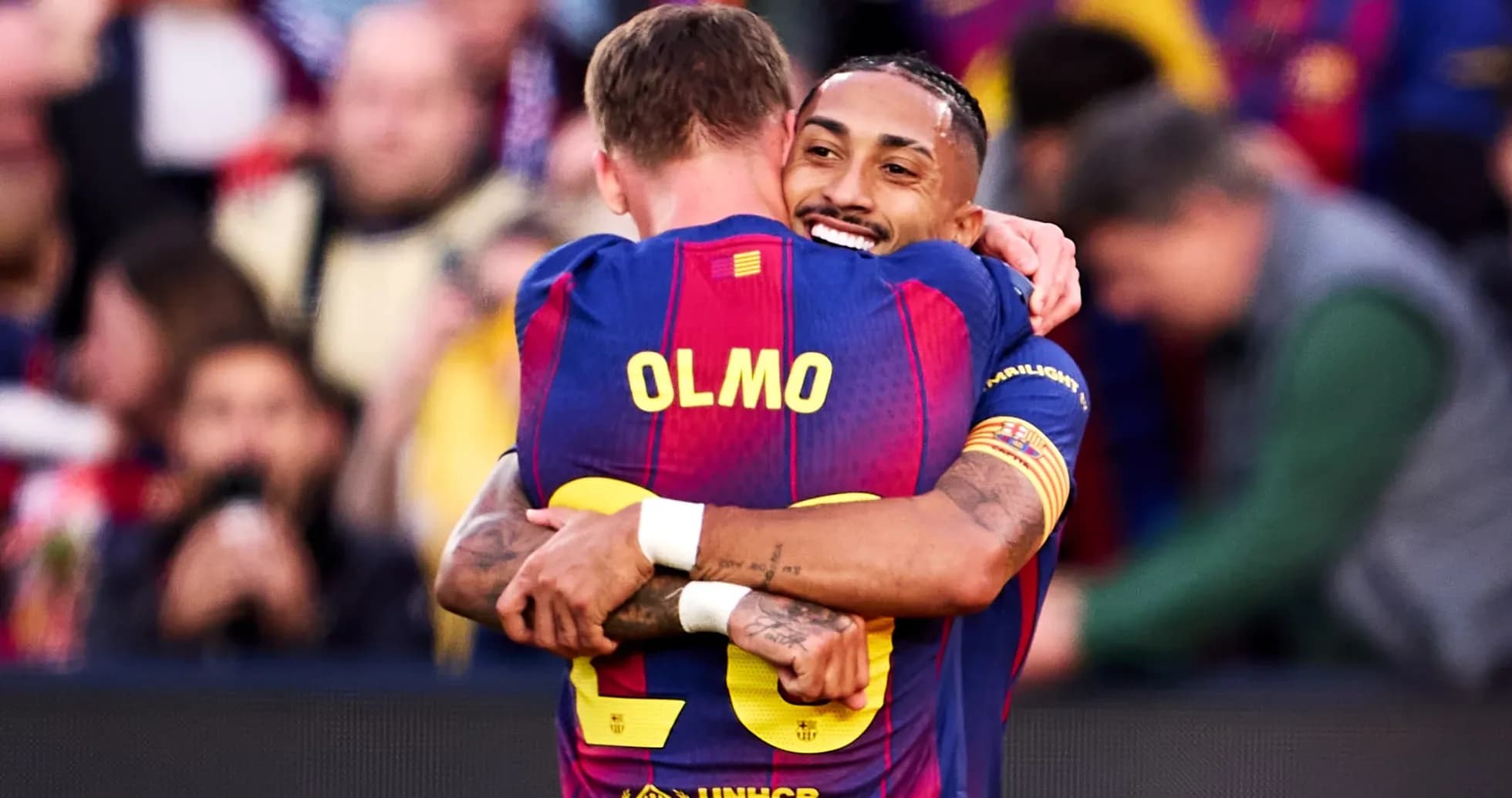 Olmo celebrating with teammate after a goal