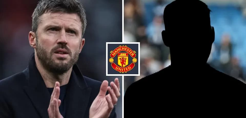 Coach applauding with Manchester United logo displayed