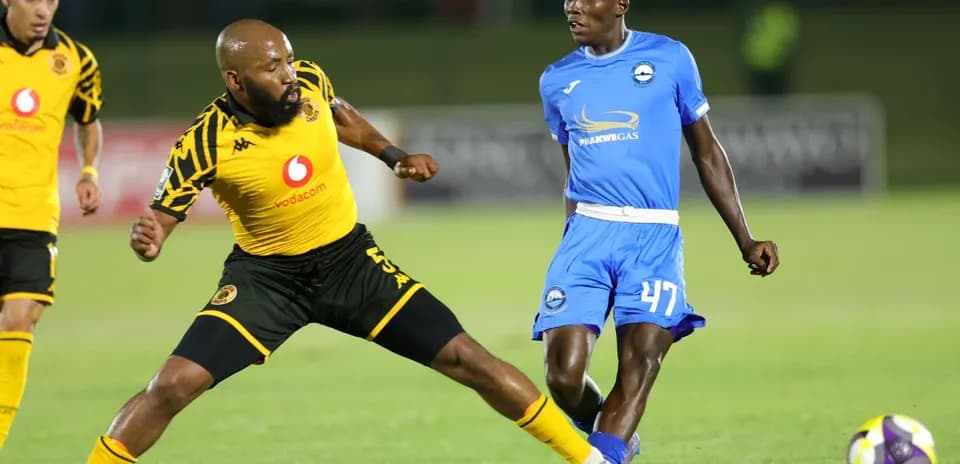 Two players competing for the ball during match