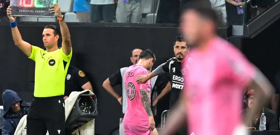 Substitution board raised as player exits match