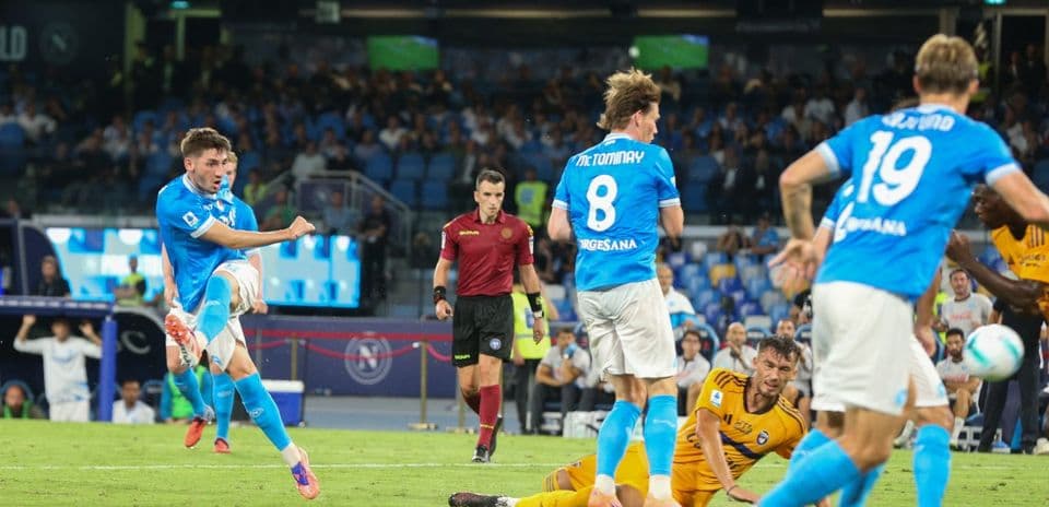 Napoli player shooting on goal during match
