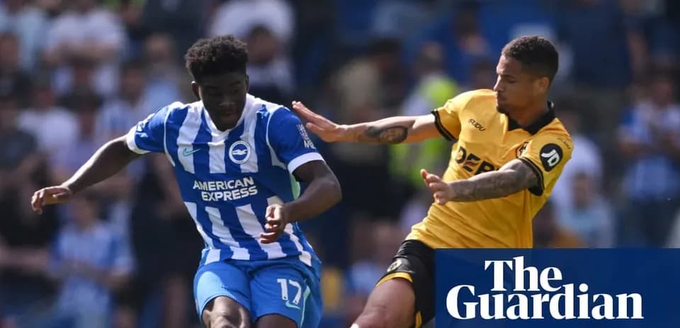 Brighton player evading challenge from opposing player