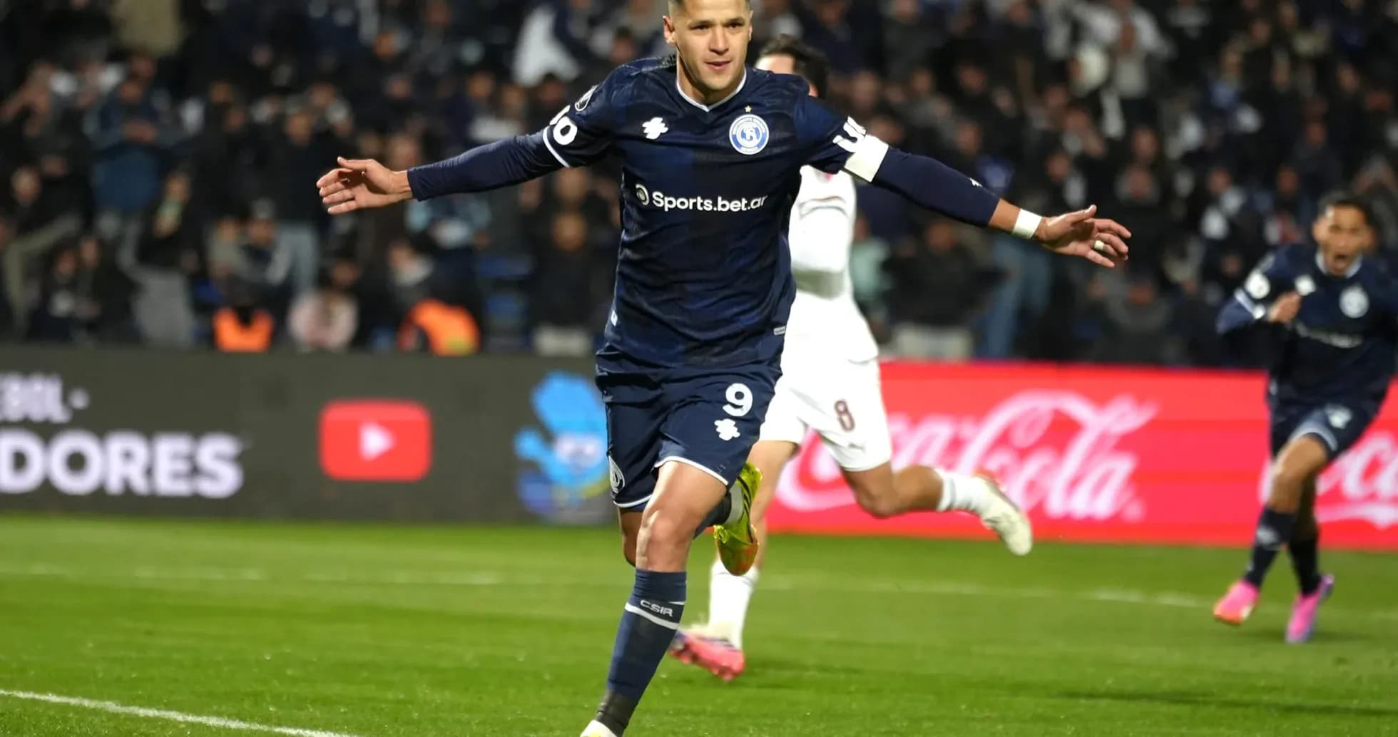 Player celebrating a goal during football match