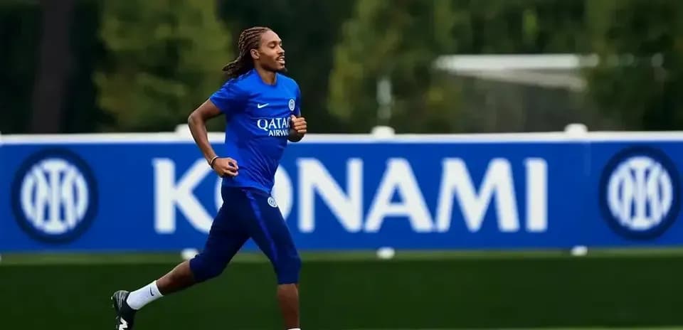 Player running during training session on pitch