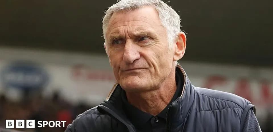 Manager on the sidelines during a match