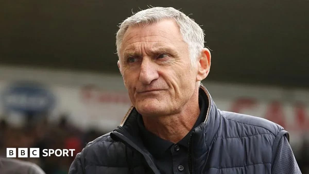 Manager on the sidelines during a match