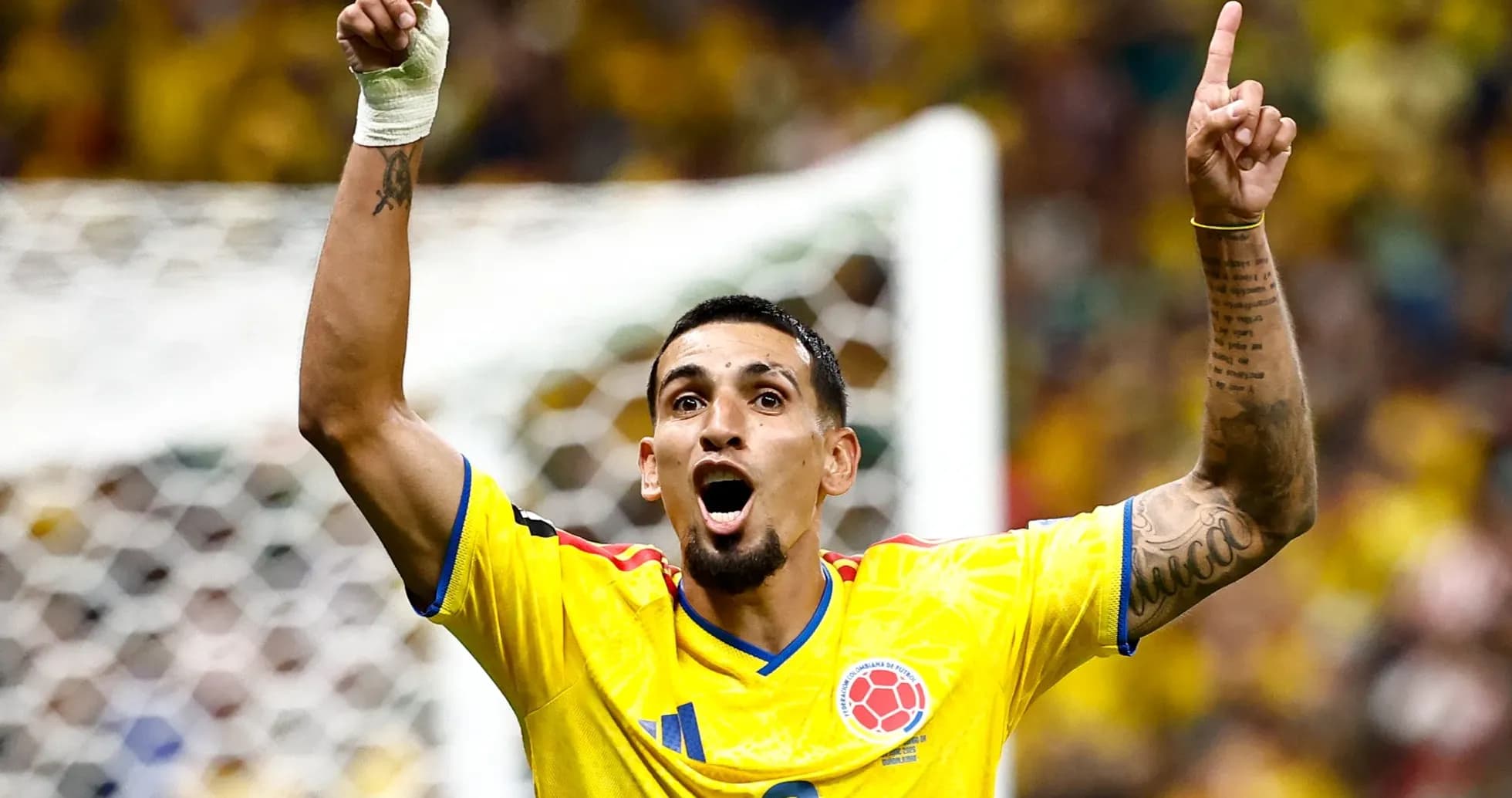 Player celebrating after scoring a goal for Colombia