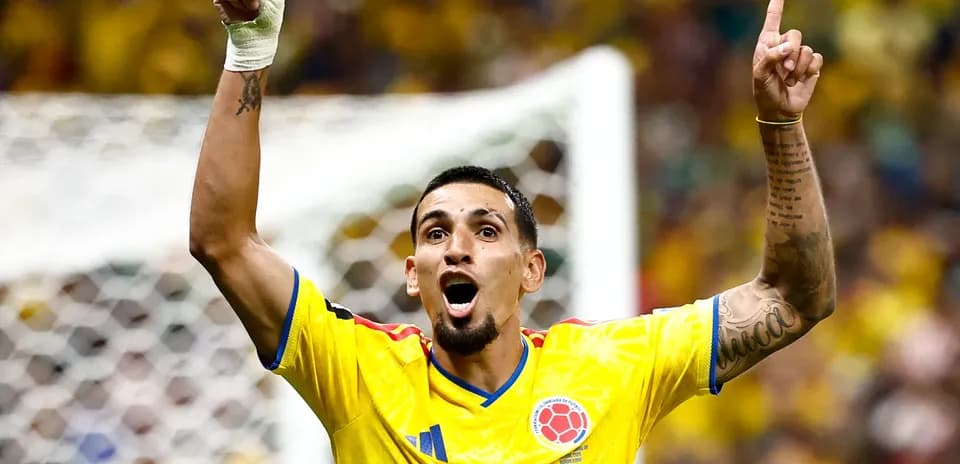 Player celebrating after scoring a goal for Colombia