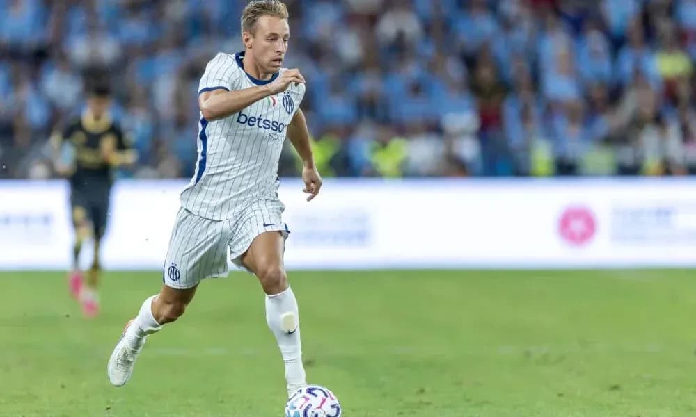Player running with ball during a football match