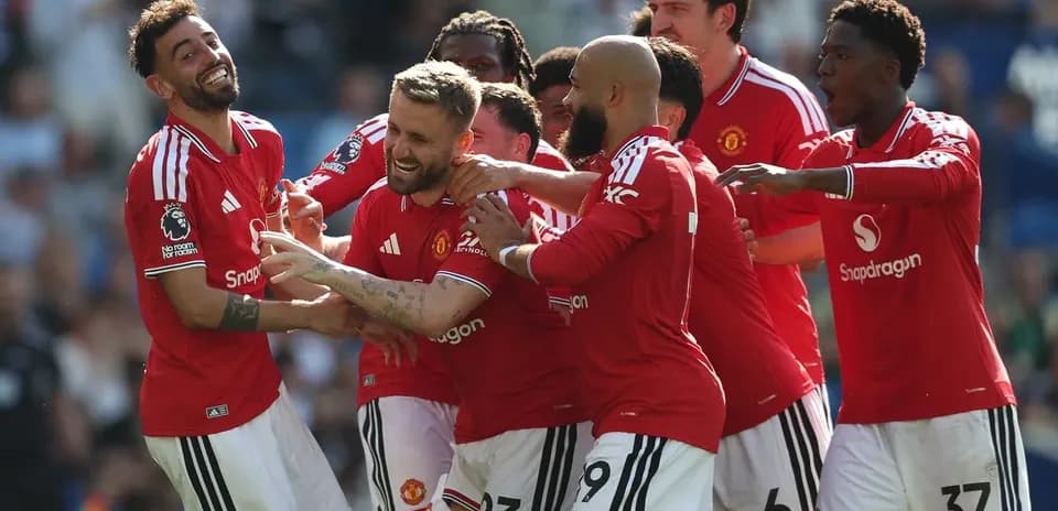 Manchester United players celebrating a goal