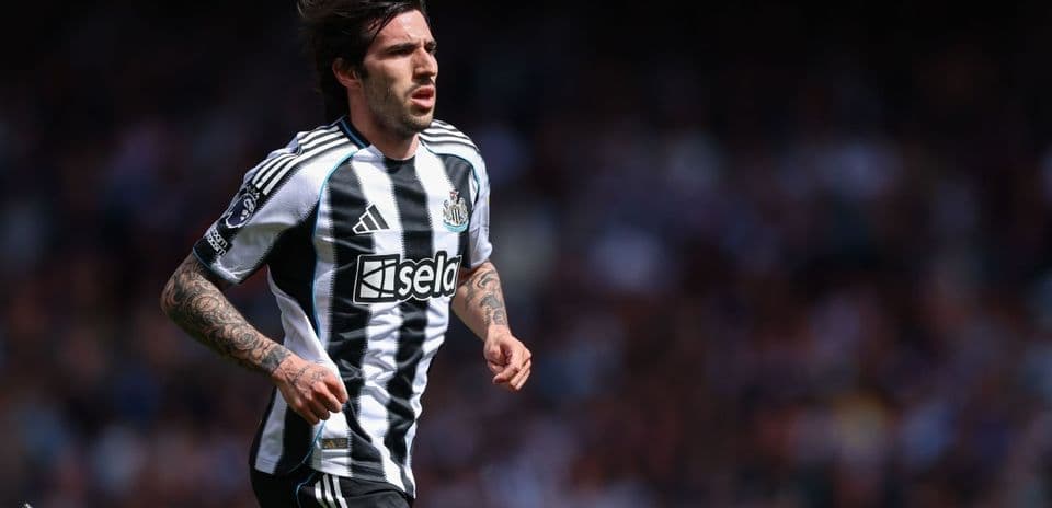 Newcastle player running during a match