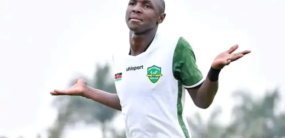Player celebrating a goal with open arms