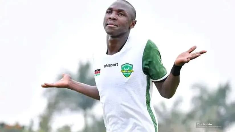 Player celebrating a goal with open arms