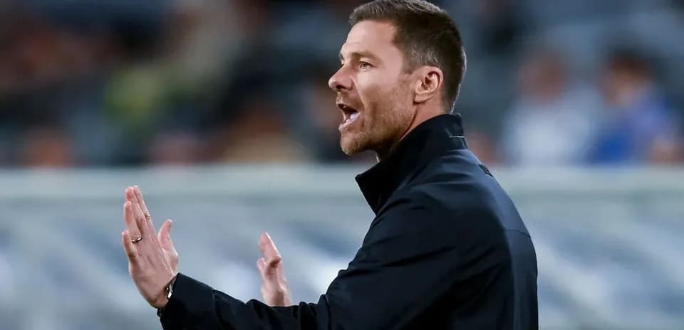 Coach gesturing while giving instructions during match