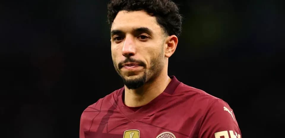 Player in maroon jersey during match