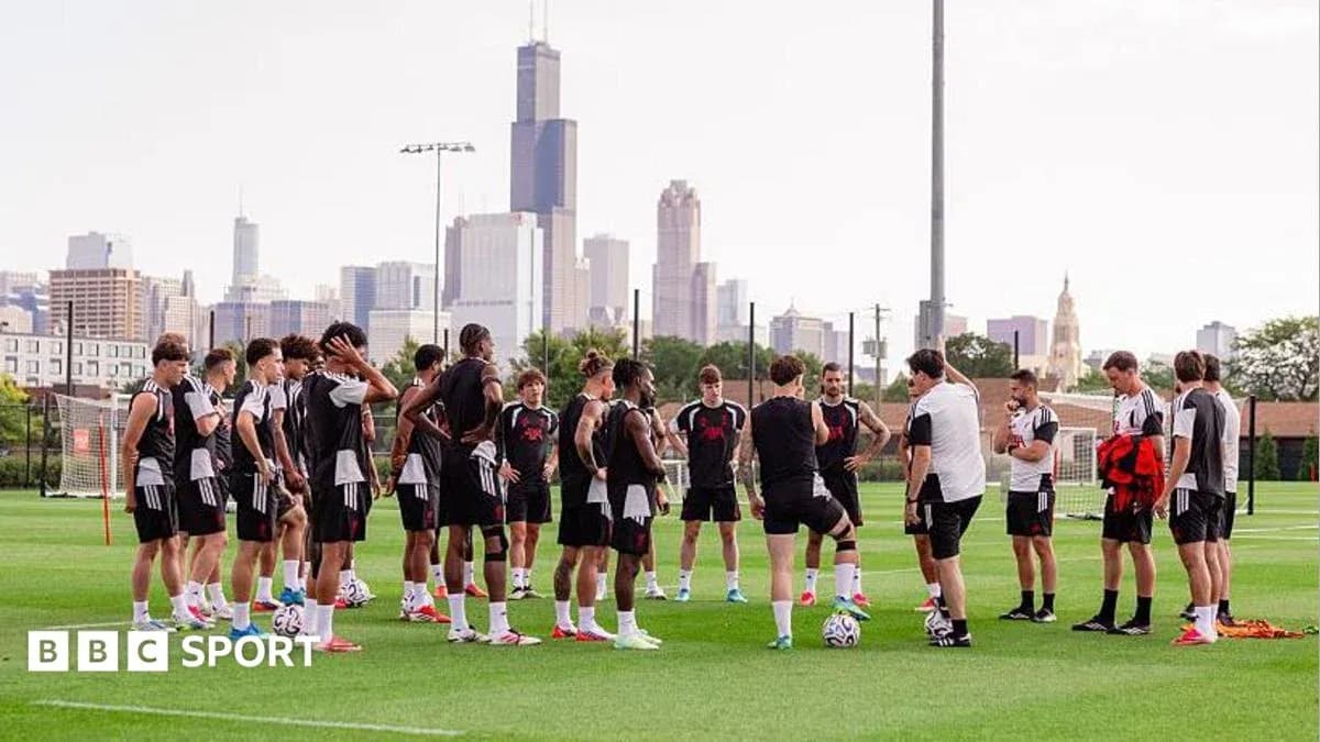 Soccer team gathered for discussion during training session