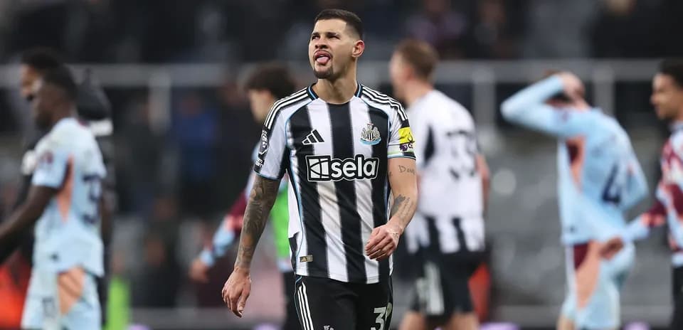 Newcastle player walking off field after match