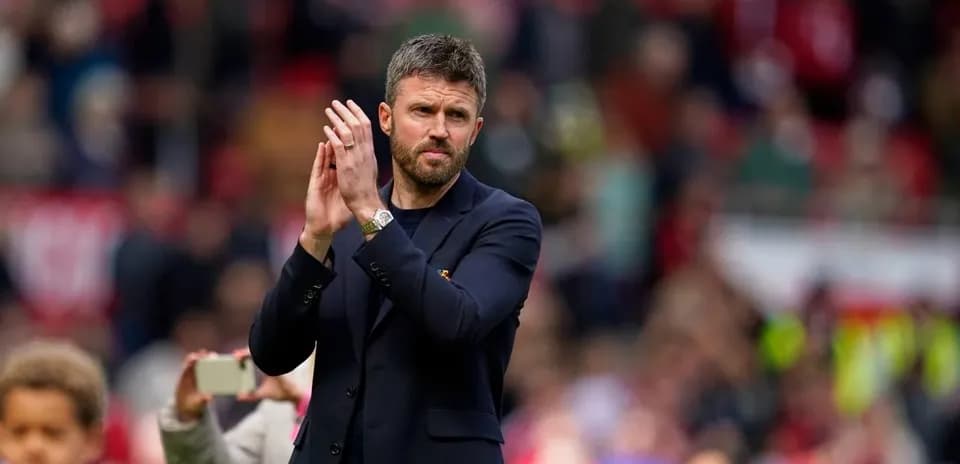 Coach applauding fans after a match