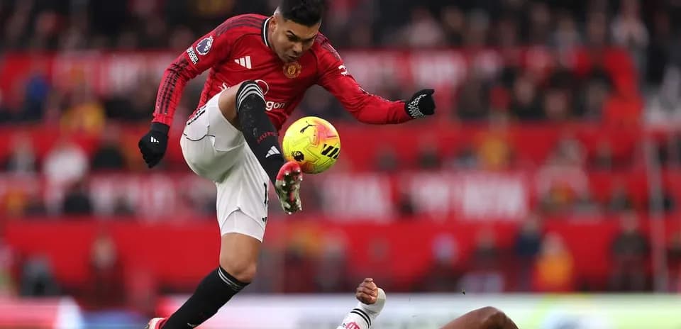 Manchester United player in action against Fulham