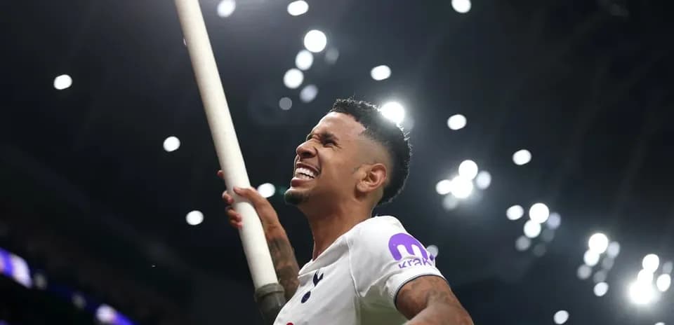Player celebrating with a flag during match