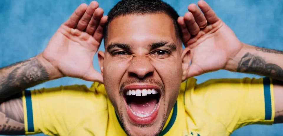 Player in yellow jersey making a playful gesture