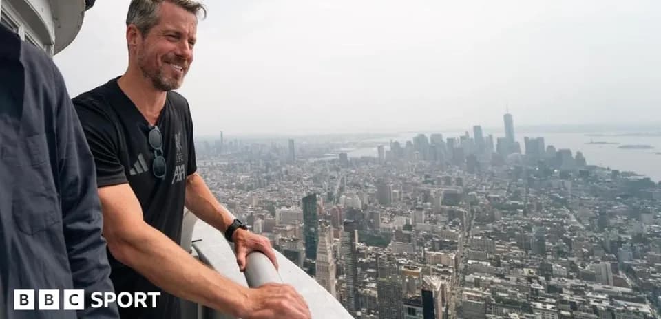 Person overlooking city skyline from high vantage point