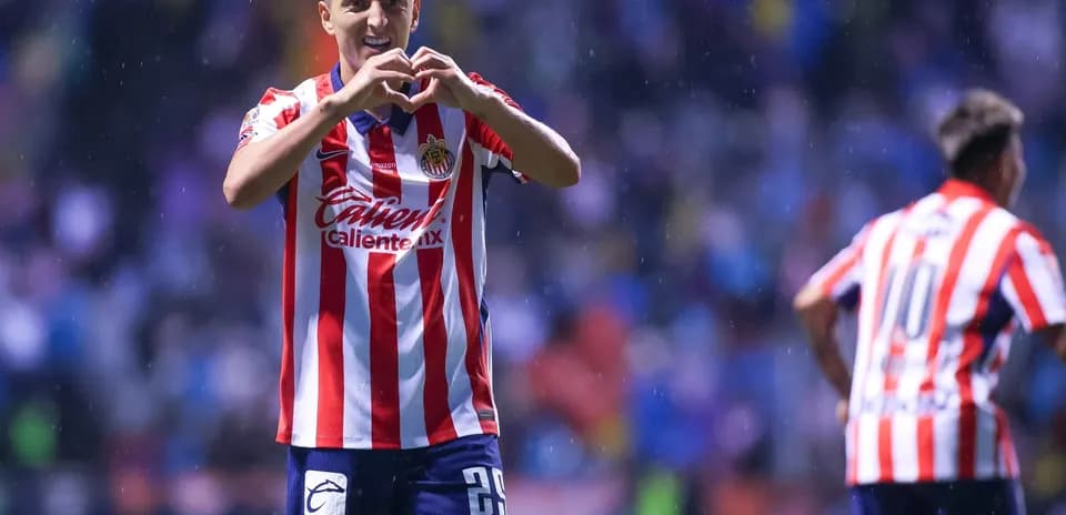 Chivas player celebrating a goal during match