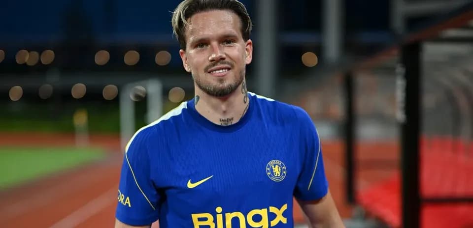Player wearing Chelsea jersey on training pitch