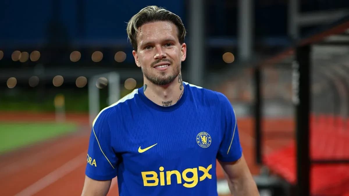 Player wearing Chelsea jersey on training pitch
