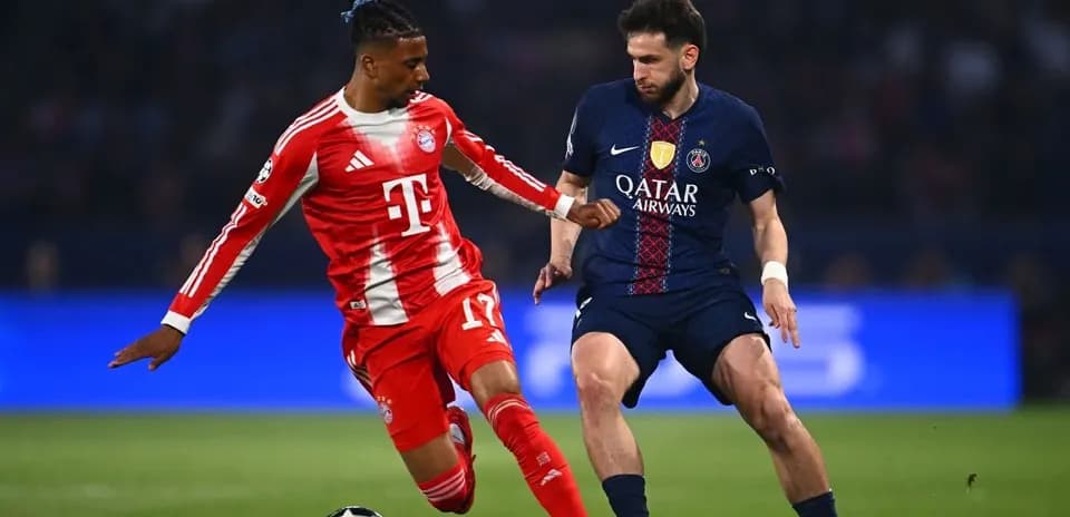 Two players contesting the ball during match