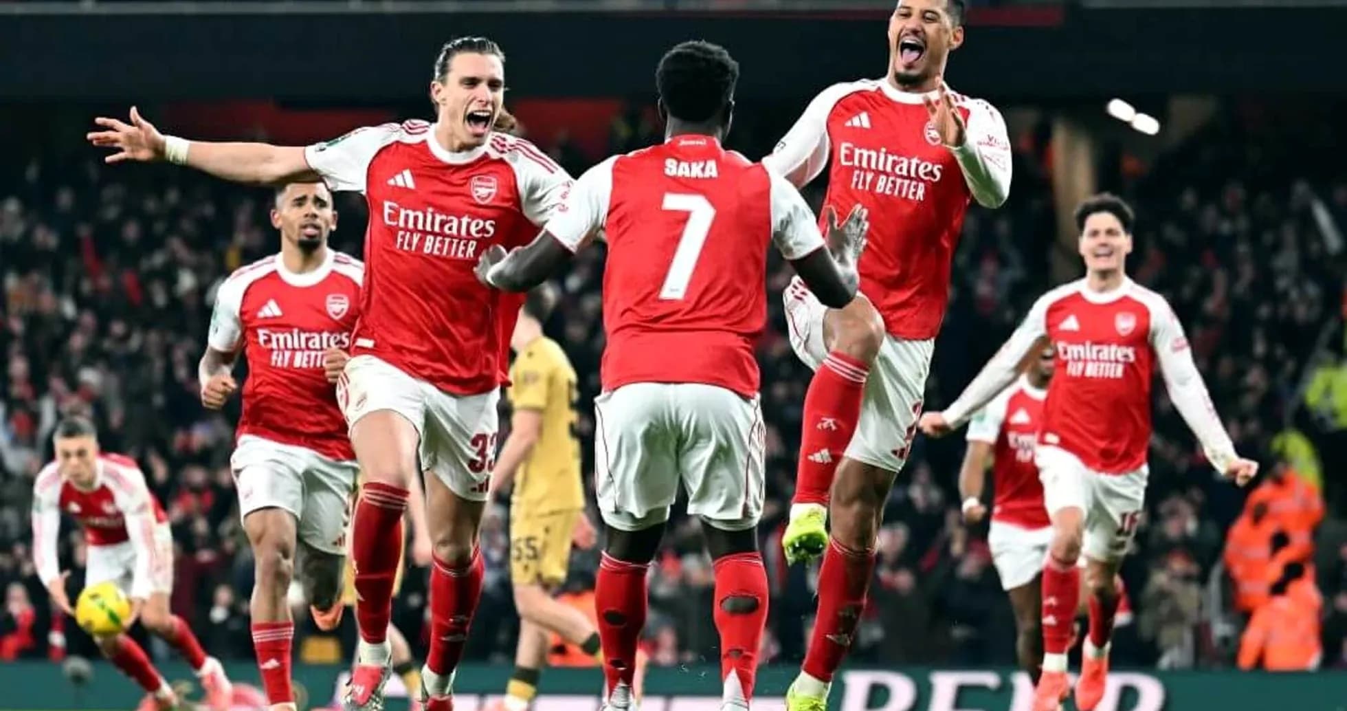 Arsenal players celebrating a goal during match