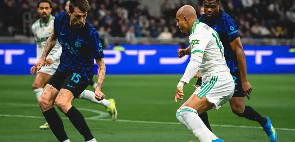 Inter player dribbling against AS Roma during match