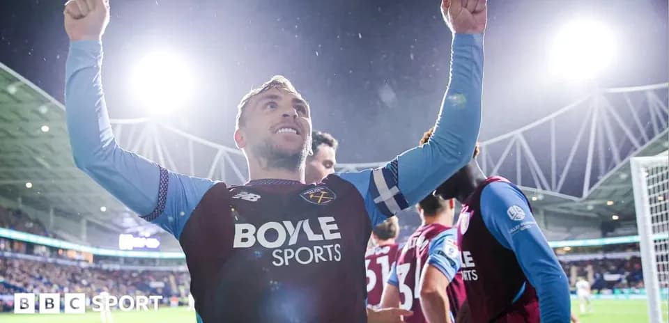 Player celebrating with raised arms during match