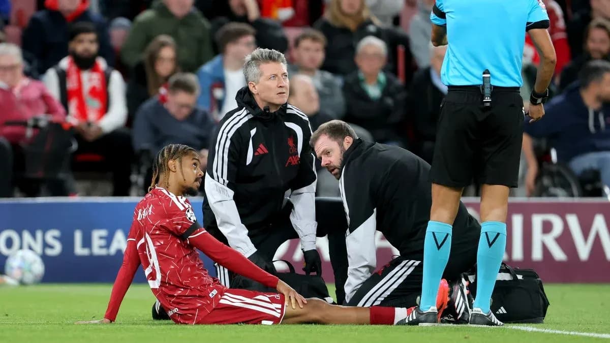 Player receiving medical attention on the sidelines