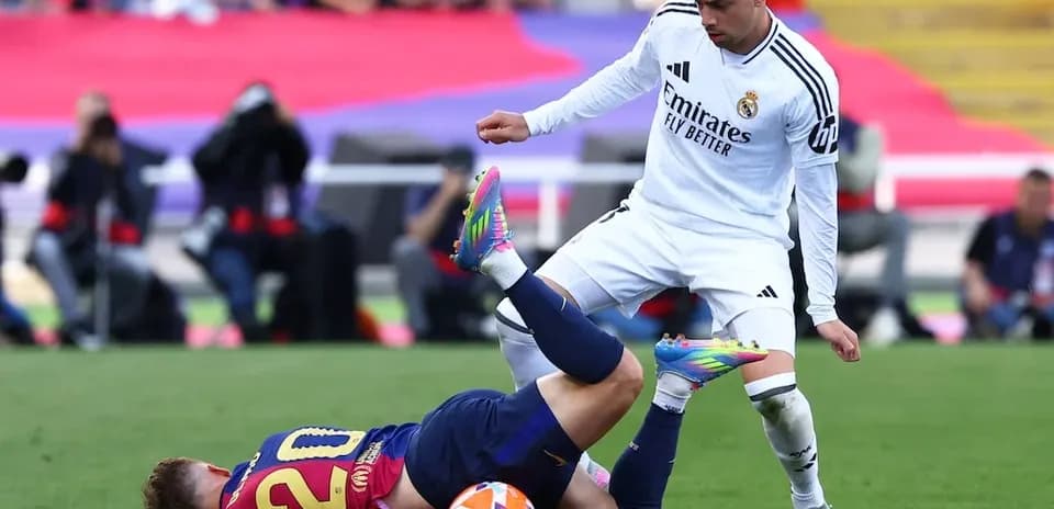 Barcelona player falls during match against Real Madrid