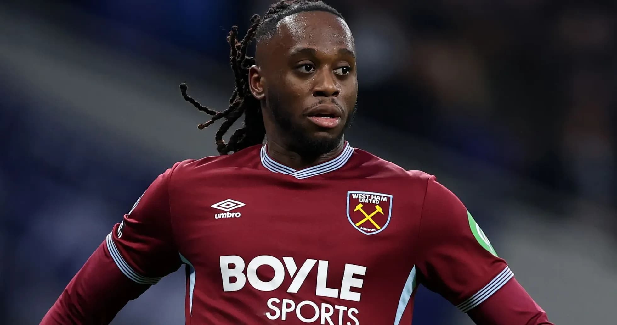 Player in West Ham United kit on the pitch