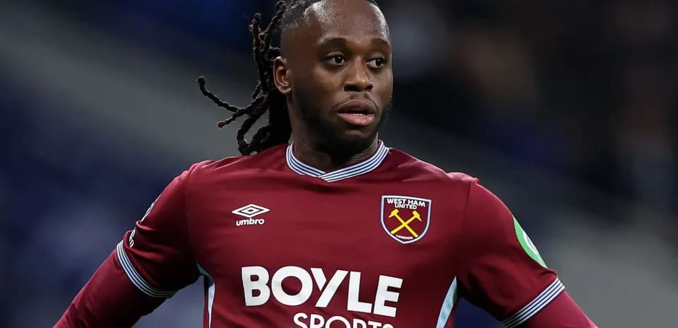 Player in West Ham United kit on the pitch