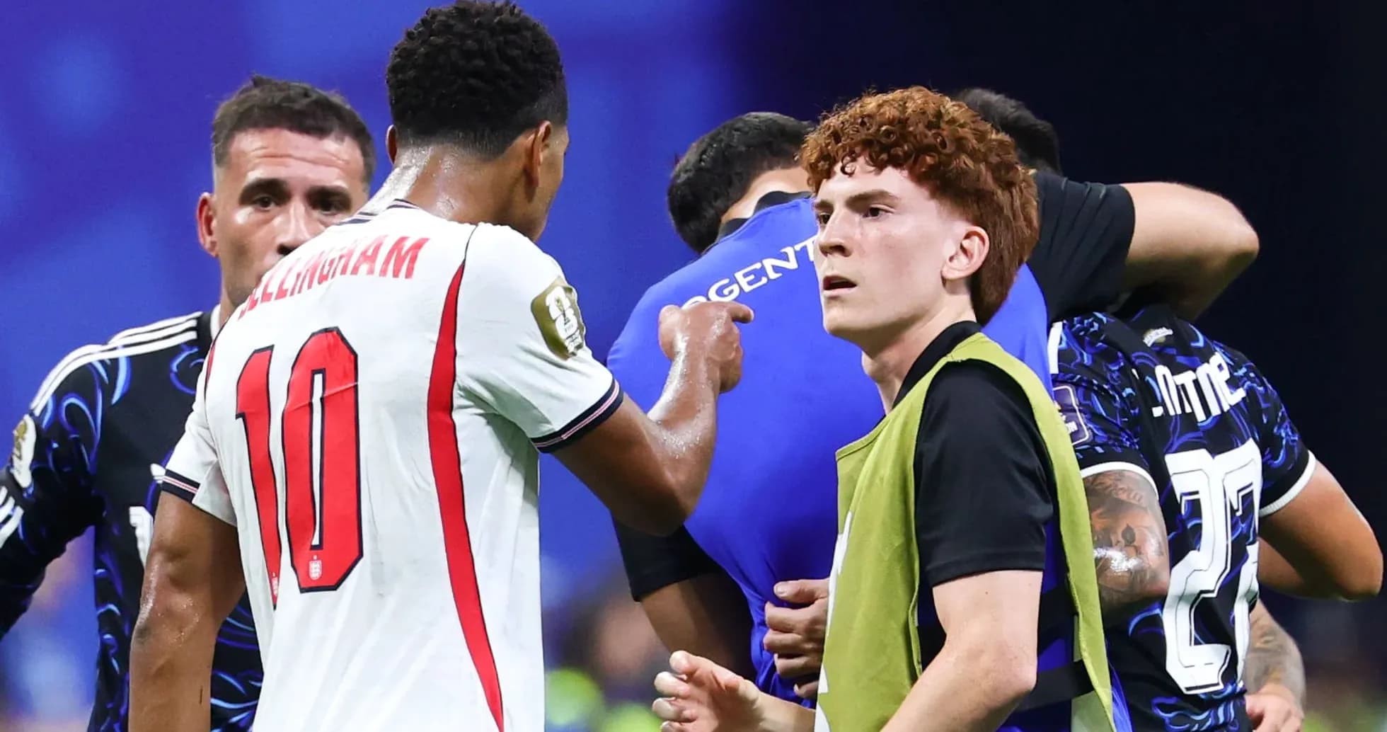 Players interacting during a match on the field