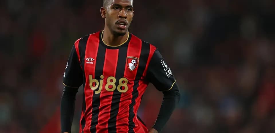 Player in Bournemouth's red and black kit during match