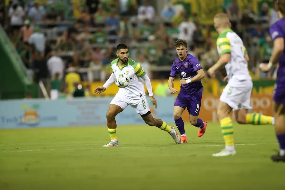 Louisville City player challenges Tampa Bay Rowdies player