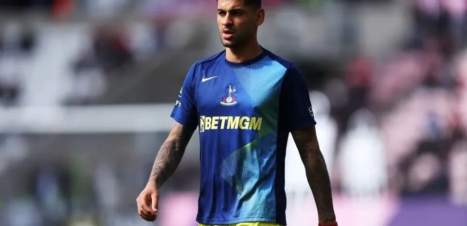 Player walking on field in training kit