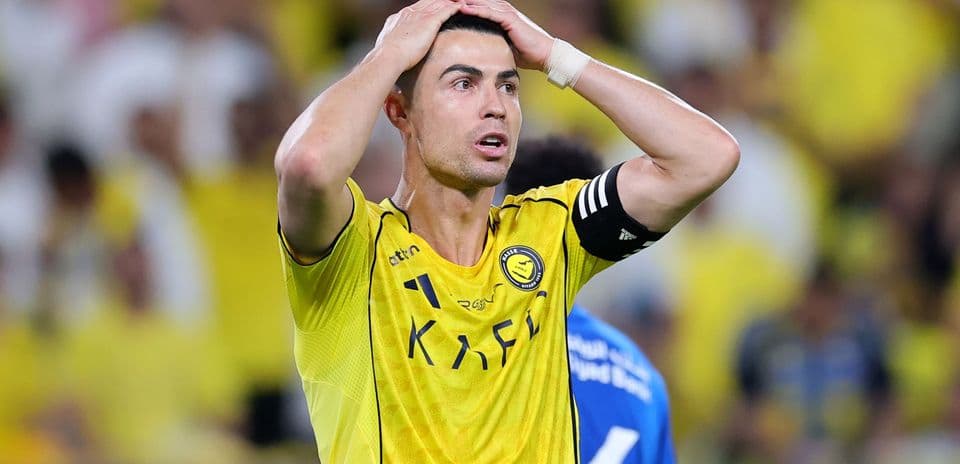 Player in yellow jersey reacting during match