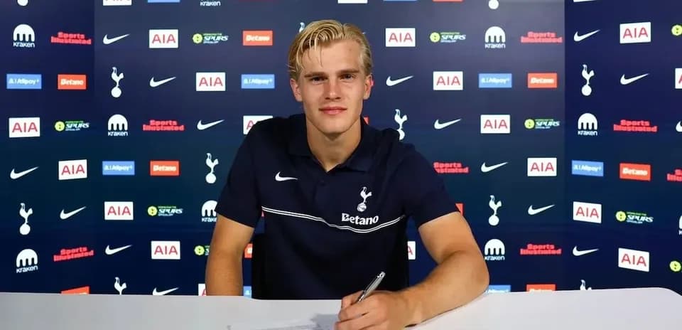 Player signing contract at Tottenham Hotspur press event