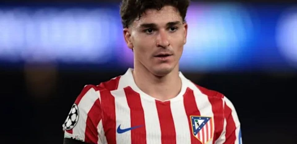 Player in Atletico Madrid jersey during match