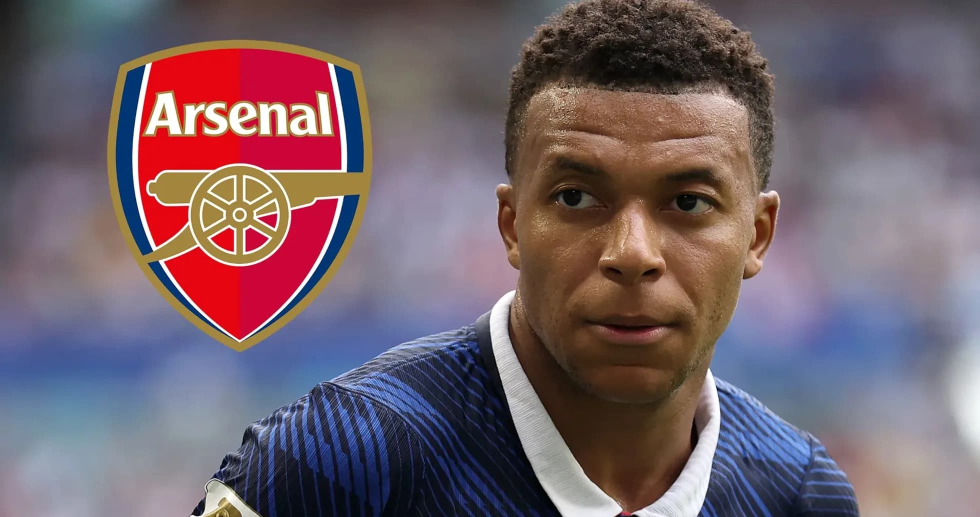 Player in blue jersey with Arsenal logo background