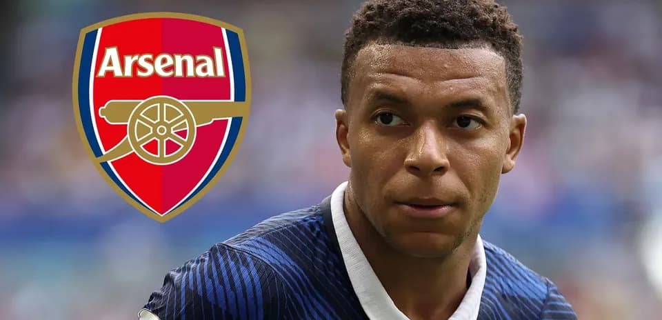 Player in blue jersey with Arsenal logo background