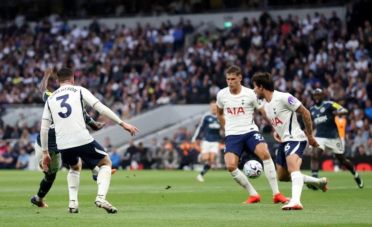 Players from Tottenham defending against an opponent