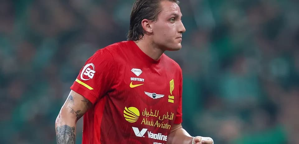 Player wearing red jersey during match