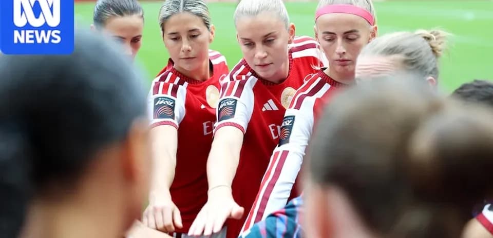 Players huddled together before the match